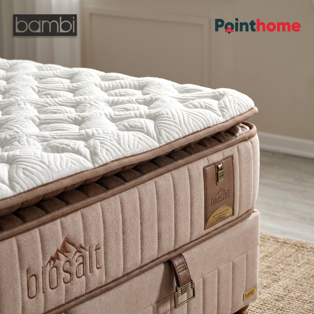 Angle du matelas Biosalt et flanc brodé du sommier coffre