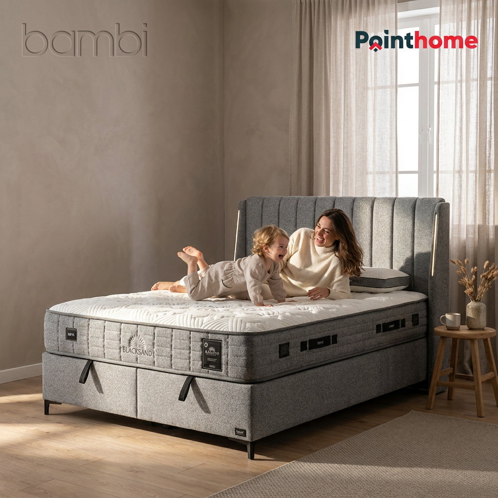 Ensemble lit coffre Bambi Blacksand dans une chambre beige à niches