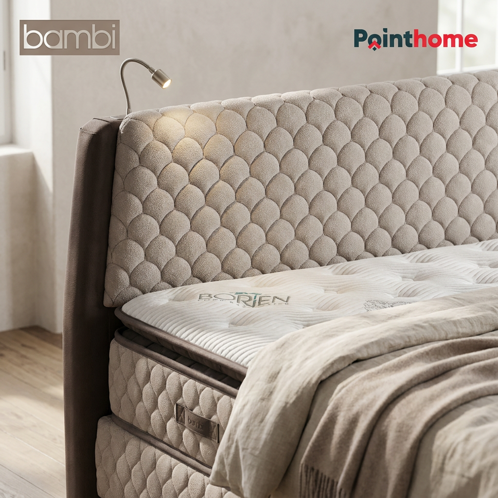 Détail de la tête de lit capitonnée Borjen et du dessus de matelas