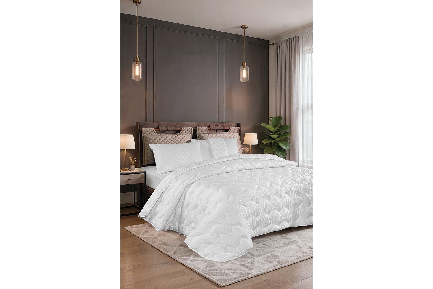 Couette Mogy installée sur un lit dans une chambre moderne